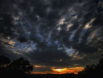 Low angle view of dramatic sky during sunset