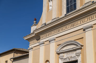 Low angle view of historic building against sky