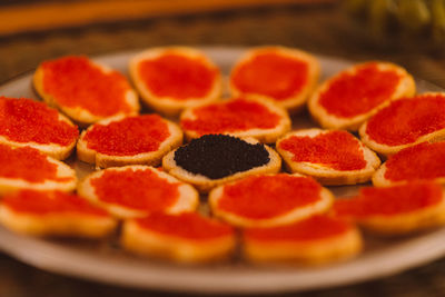 Close-up of breads with caviars on plate