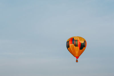 Low angle view of hot air balloon flying in sky