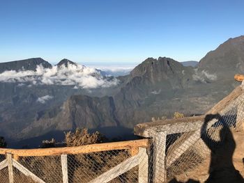 Panoramic view of mountain range against clear blue sky