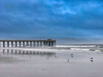 Scenic view of beach against sky