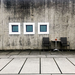 View of concrete building with windows