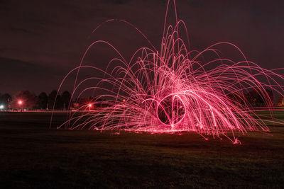 Light trails against sky at night