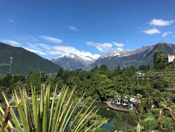 Scenic view of landscape and mountains against sky