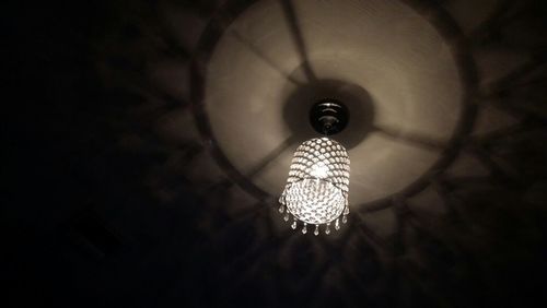 Low angle view of illuminated chandelier