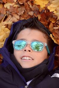 Portrait of young woman wearing sunglasses