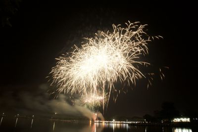 Firework display at night