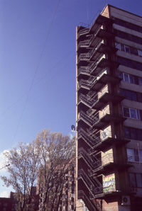 Low angle view of skyscraper against clear sky