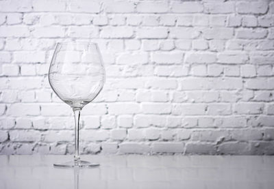 Close-up of wineglass on table