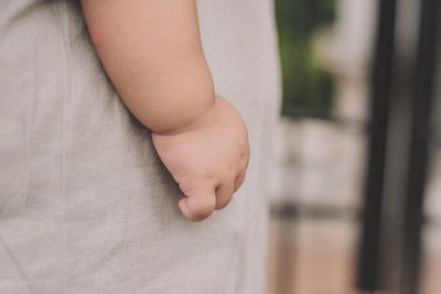 Low section of child standing on floor