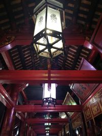 Low angle view of illuminated ceiling