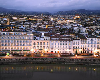 Buildings in city at night