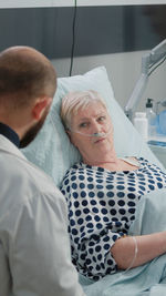 Doctor examining patient at hospital