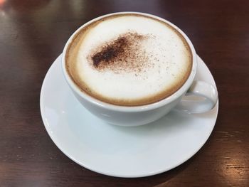 High angle view of cappuccino on table