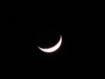 Close-up of moon over black background