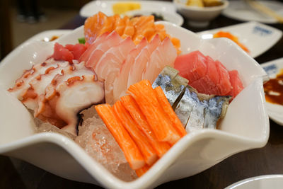 Close-up of fish served in plate on table