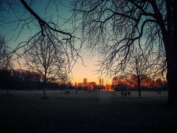 Silhouette of trees against sky during sunset