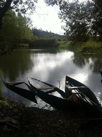 Boats in calm lake