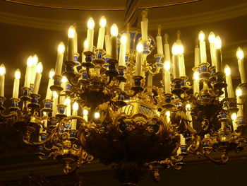 Illuminated candles in temple