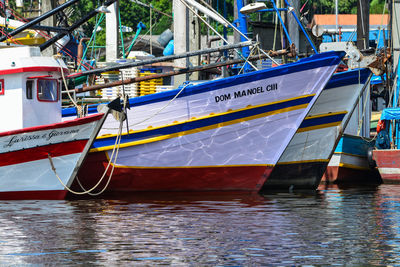 Fishing boat moored at harbor