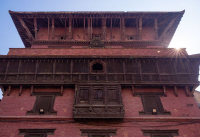 Low angle view of old building against sky