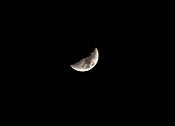 Scenic view of moon against sky at night