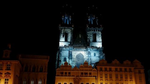 Low angle view of illuminated building at night