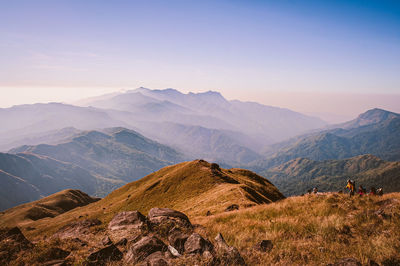 Scenic view of mountains against sky during sunset