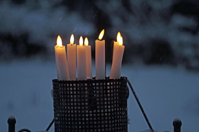 Close-up of illuminated candle