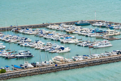 High angle view of sailboats moored in sea