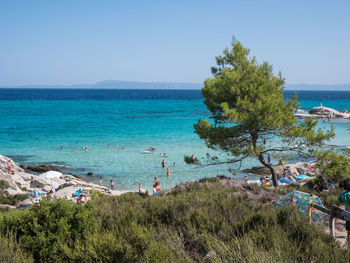 Scenic view of sea against clear blue sky