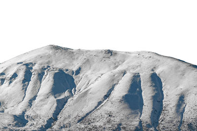 Scenic view of snowcapped mountains against clear sky