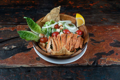 High angle view of meal served in plate on table