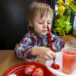 Close-up of girl eating food