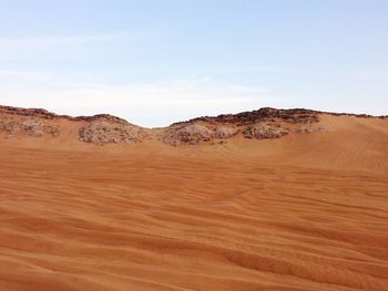 Scenic view of desert against sky