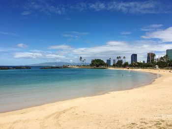 Scenic view of calm sea against blue sky