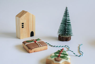 Close-up of christmas decorations on white background