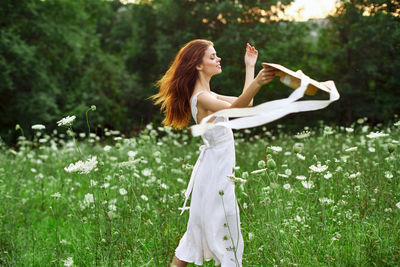 Young woman on field