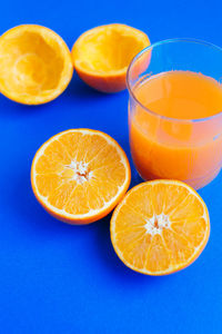 Close-up of oranges against blue background