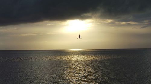 Scenic view of sunset over sea