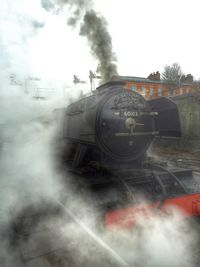 View of train against cloudy sky