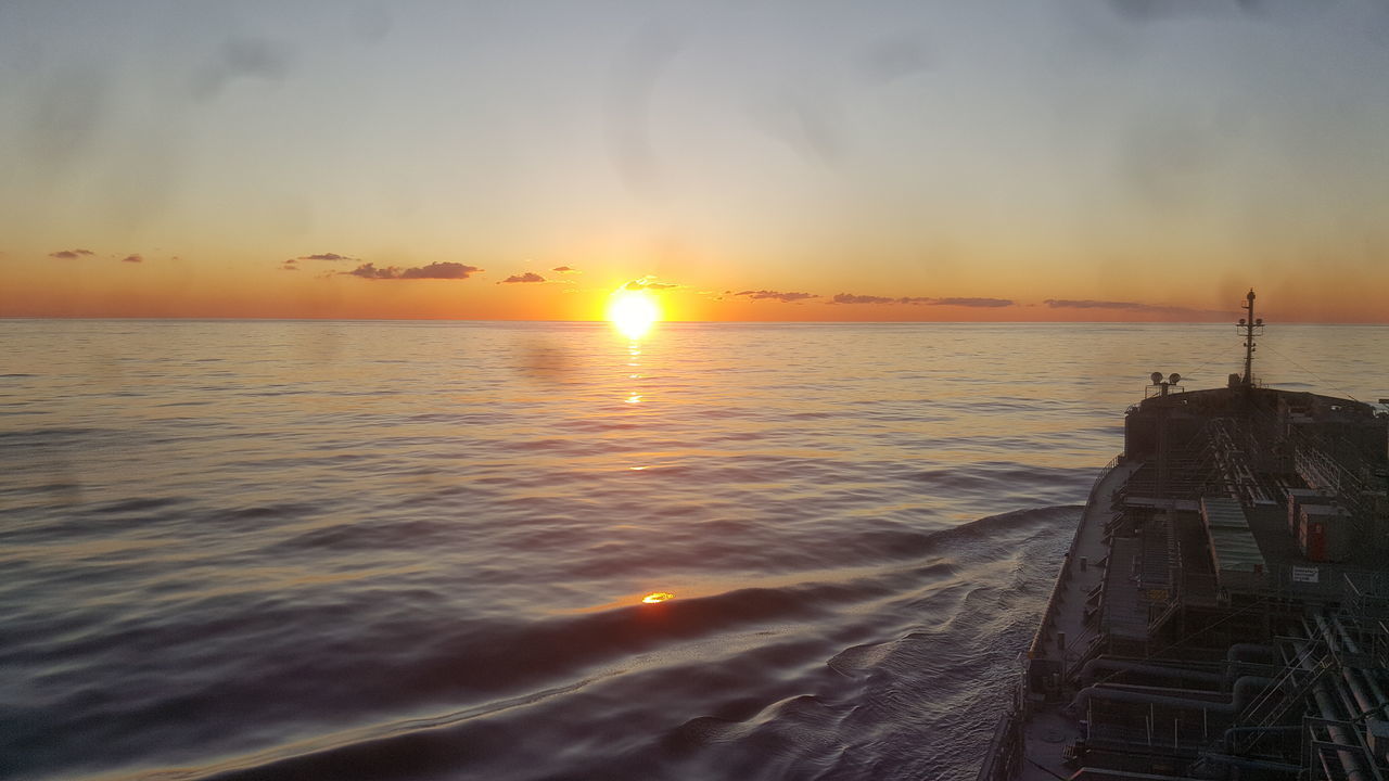 SCENIC VIEW OF SEA DURING SUNSET