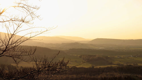 Scenic view of mountains against sky during sunset