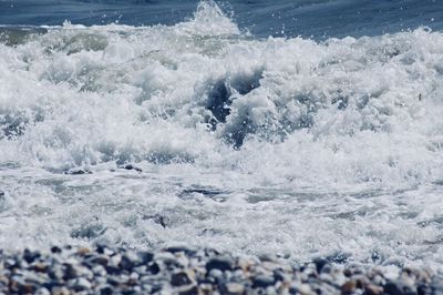 Waves splashing on shore
