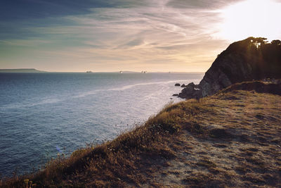 Scenic view of sea against sky during sunset