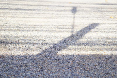 High angle view of shadow on road