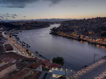 High angle view of river amidst buildings in city