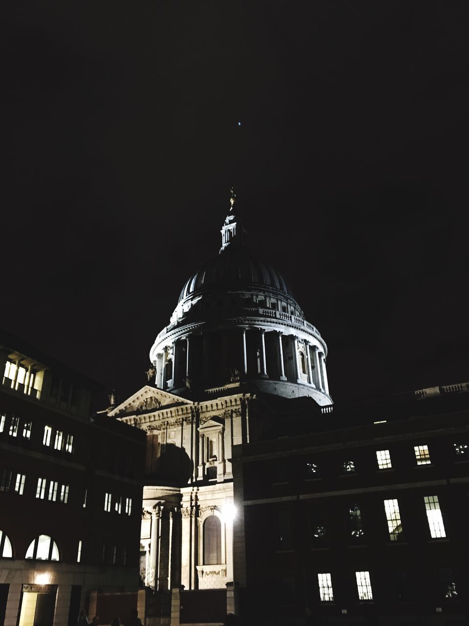 LOW ANGLE VIEW OF BUILT STRUCTURE AT NIGHT