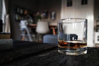 Close-up of beer glass on table